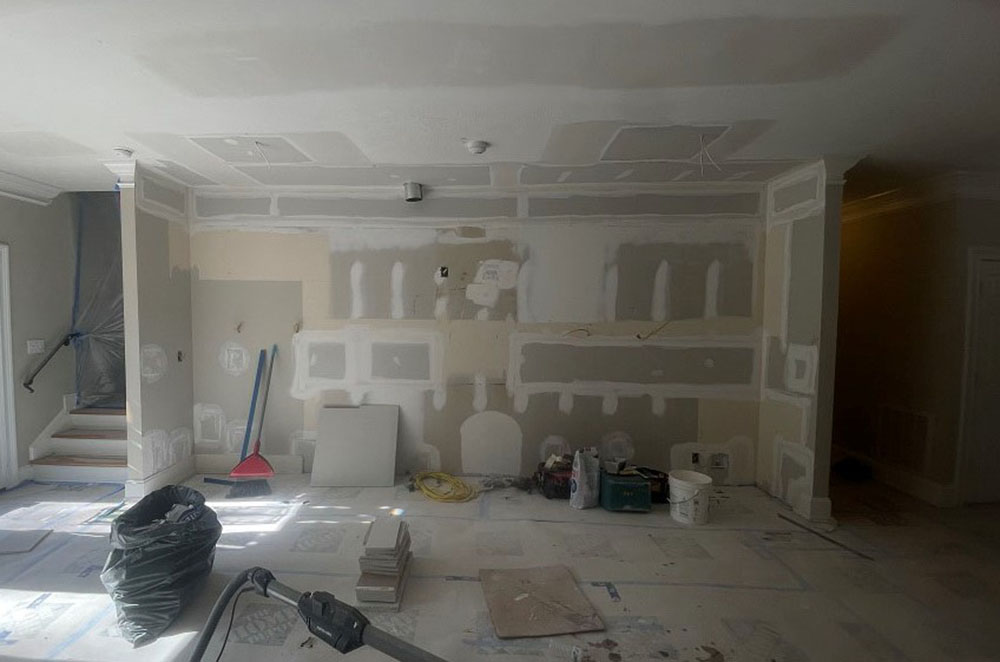 Drywall seams floated and sanded smooth before wall paint application
